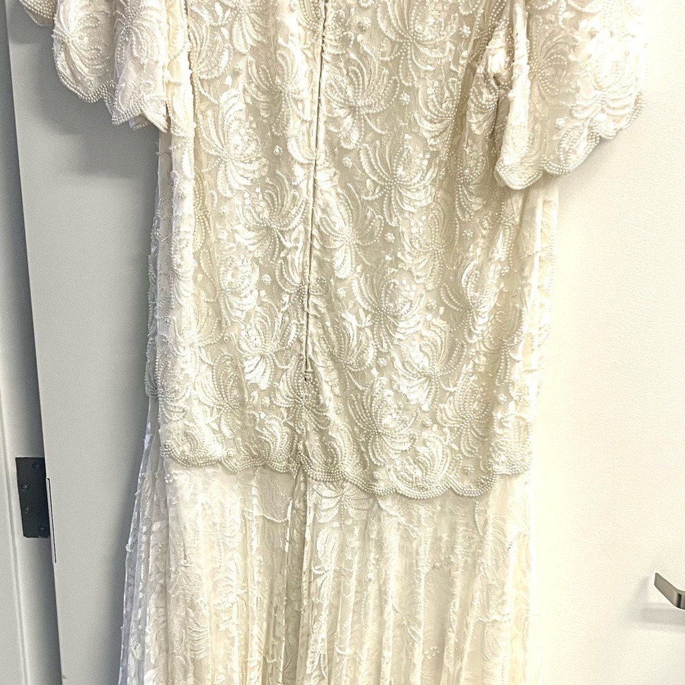 Beautiful wedding dress. Worn once. Offers welcomed.